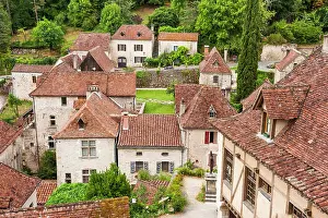 Terrace Prints: Explore historic architecture and traditional homes in Saint-Cirq-Lapopie near the Lot River in France during summer