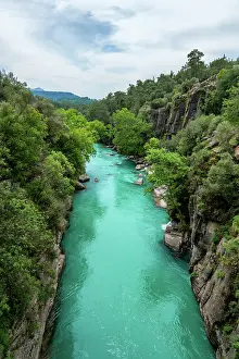 Antalya Prints: Explore Koprulu canyon with turquoise water surrounded by trees in Antalya Turkey