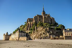 Daylight Prints: Explore Mont St Michel in France with its historic architecture and scenic landscape near the water during daylight