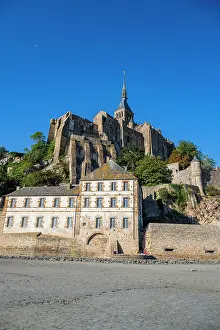Retreat Prints: Explore Mont St. Michel in France with its unique architecture and history by the sea during a clear day