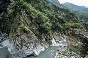 Taiwan Prints: Explore the natural beauty of Taroko Gorge with steep cliffs and flowing river in Taiwan's famous national park