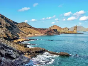 Volcano Prints: Explore Pinnacle Rock in Galapagos Islands on Bartolome Island with beautiful coast and volcanic landscape in Ecuador