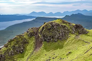 Ridge Prints: Explore the rugged hills and scenery of the Trotternish escarpment on the Isle of Skye in Scotland during a clear day