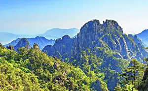 Mountainous Prints: Explore the rugged peaks and lush forests of Huangshan Mountain in Anhui Province