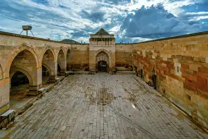 Cappadocia Prints: Explore Saruhan Caravanserai, a medieval lodge in Cappadocia with stone architecture and vast courtyard
