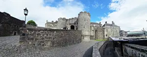 Stronghold Prints: Explore Stirling Castle with its strong stone walls and history on a cloudy day in Scotland
