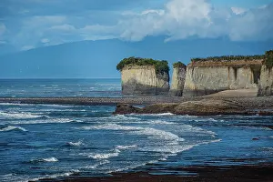 Zealand Prints: Explore stunning white cliffs along the rugged Tasman Sea coast near Cape Foulwind in New Zealand with dramatic