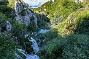 Waterfalls Prints: Explore waterfalls and lakes in Plitvice Lakes National Park with lush greenery in Croatia during daylight hours