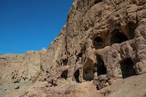 Dusty Prints: Exploring ancient caves in Bamyian, Afghanistan with visible carvings