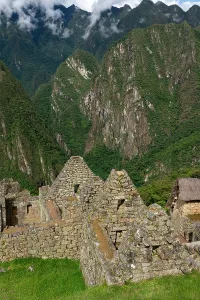 Preserved Prints: Exploring the ancient Inca ruins at Machu Picchu in Peru surrounded by high mountains and green valleys