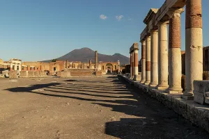 Columns Prints: Exploring ancient Pompei ruins with Mount Vesuvius in the background in Campania, Italy