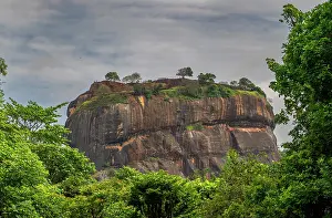 Province Prints: Exploring the ancient rock fortress Sigiriya in Central Province Sri Lanka surrounded by lush green trees