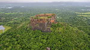 Province Prints: Exploring the ancient rock fortress of Sigiriya surrounded by lush greenery in Central Province