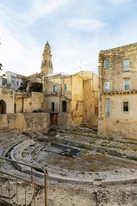Center Prints: Exploring the ancient ruins in the historic center of Lecce in Italy during the late afternoon