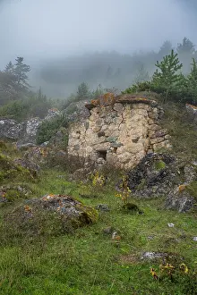 Stones Prints: Exploring ancient stones and ruins in a foggy landscape of North Ossetia in the Caucasus mountains