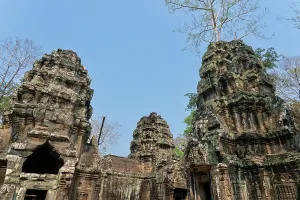 Cambodia Prints: Exploring the ancient structures of Ta Prohm Temple in Angkor during daylight hours in Cambodia