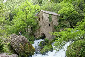Southern Prints: Exploring the ancient water mill in the Gorges of the Vis River surrounded by lush green trees