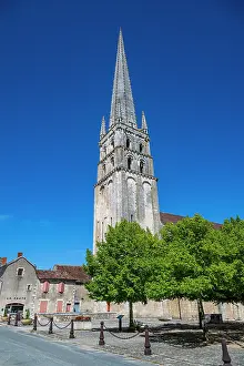 Public Prints: Exploring the architecture of the Abbey Church of Saint-Savin-sur-Gartempe in France under a clear blue sky
