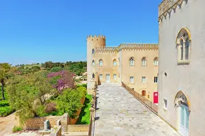 Ragusa Prints: Exploring the architecture and gardens of Donnafugata Castle in Sicily on a clear day with blue skies
