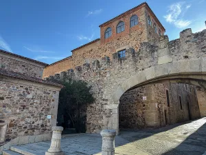Cobblestone Prints: Exploring Arco de la Estrella in Plaza Major in Caceres