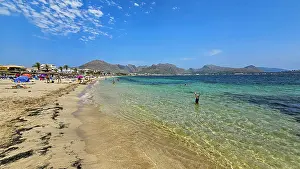 Swimming Prints: Exploring the clear waters and sandy beach in Port de Pollenca