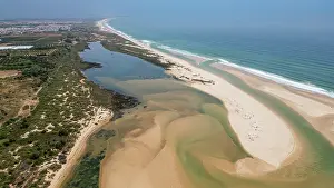Dunes Prints: Exploring long sandy beaches near historic Cacela Velha in Faro region of Portugal