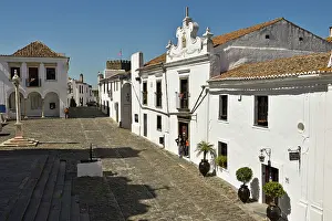 Alentejo Prints: Exploring the main square in Monsaraz revealing historic buildings and cobblestone paths in Portugal's Alentejo