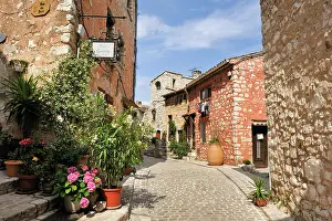 Cobblestone Prints: Exploring a narrow street in the village of Tourrettes-sur-Loup in the Alpes-Maritimes region of France
