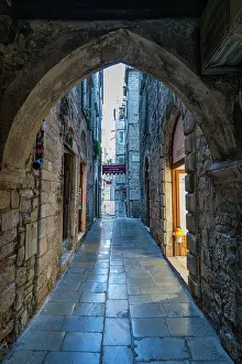 Streets Prints: Exploring the narrow streets of Diocletian's Palace in Split, Croatia during the day
