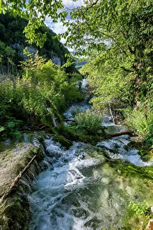 Flowing Prints: Exploring the natural beauty of waterfalls and streams at Plitvice Lakes National Park in Croatia during the day