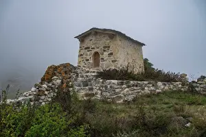 Cemetery Prints: Exploring an old necropolis in the Caucasus region of North Ossetia, Russia on a foggy day