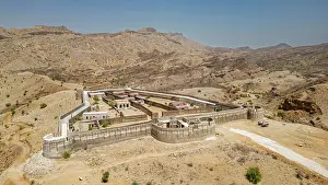 Dusty Prints: Exploring Ranikot fort in Sindh provides a view of its historic architecture and surrounding landscape in Pakistan