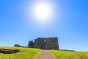 United Prints: Exploring the remains of Dundonald Castle under a bright sun in South Ayrshire, Scotland