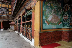 Meditation Prints: Exploring Rinpong Dzong Monastery with colorful murals and traditional architecture in Paro Bhutan