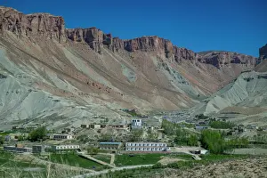 Ecology Prints: Exploring the rugged landscapes of Band-e-Amir National Park in Afghanistan with mountains and villages