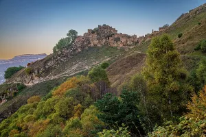 Decline Prints: Exploring the ruins of an abandoned village in Dagestan, Russia, on a clear autumn day