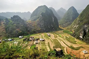 Terraces Prints: Exploring Sa Phyn valley with rice terraces and mountains near Dong Van in Northern Vietnam