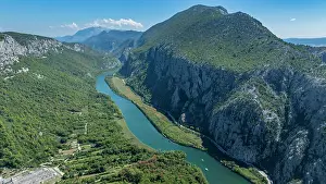 Canyon Prints: Exploring the shapes of Cetina gorge and river in Croatia with greenery and mountains in view