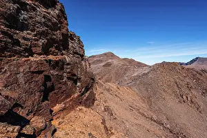 Slopes Prints: Exploring towering cliff walls in Sierra Nevada National Park located in Andalusia
