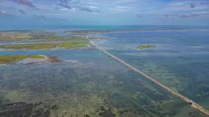 Ecology Prints: Exploring waterway and landscape of Jaffna in Sri Lanka during daytime with clouds in sky