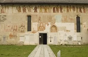 Extensive fresco treatment of the exterior of the ancient church of Chiesa di Vigilio