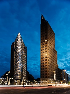 Exterior of Debis Tower and Kollhoff Tower at night, Potsdamer Platz, Berlin, Germany