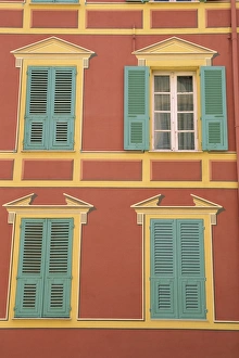 Ajaccio Prints: Exterior of a formal facade, brightly painted, with blue shutters and orange walls