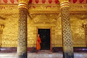 Exterior gilded relief on Wat Mai Suwannaphumaham