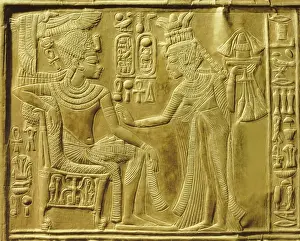 Gilt Prints: Detail of the exterior of the gilt shrine showing the queen bringing unguents