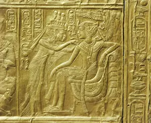 Gilt Prints: Detail of the exterior of the gilt shrine showing the queen fastening a necklace around the kings neck