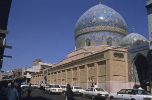Baghdad Prints: Exterior of the Sheikh Omar Mosque with blue tiles on dome