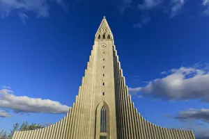 Exterior view of Hallgrimskirkja, the largest Lutheran church in Reykjavik, blue sky