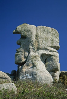 Faces in the rocks, Le Pere Trebeurden, at Trebeurden on the Cote de Granit Rose on the Cotes d Amor, Brittany