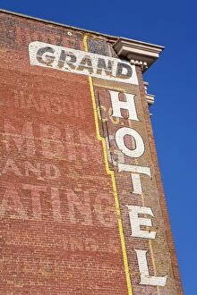 Faded murals on the Grand Hotel, National Historic District, Butte, Montana